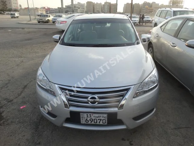Nissan  Sentra  2014  77,000  Sedan  Automatic  4  Cloth  FWD  Silver  Gasoline