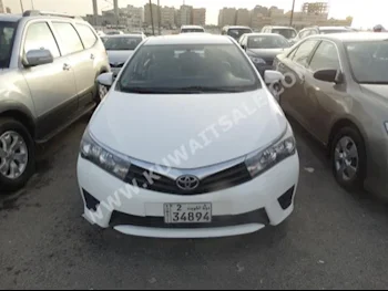 Toyota  XLI  Corolla  2015  120,000  Sedan  Automatic  4  Cloth  FWD  White  Gasoline