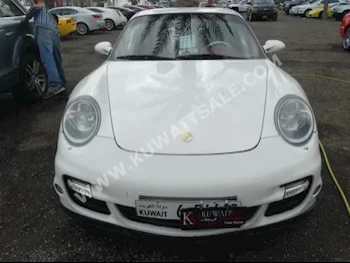 Porsche  Carrera  911  2008  162,000  Coupe / Sport  Automatic  6  Leather  RWD  White  Gasoline