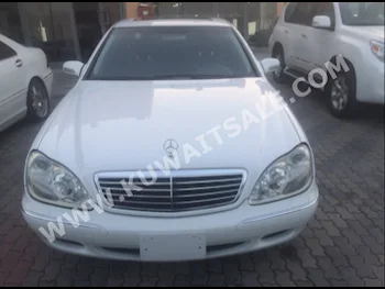 Mercedes-Benz  320  C-Class  2001  100  Sedan  Automatic  6  Leather  RWD  White  Gasoline