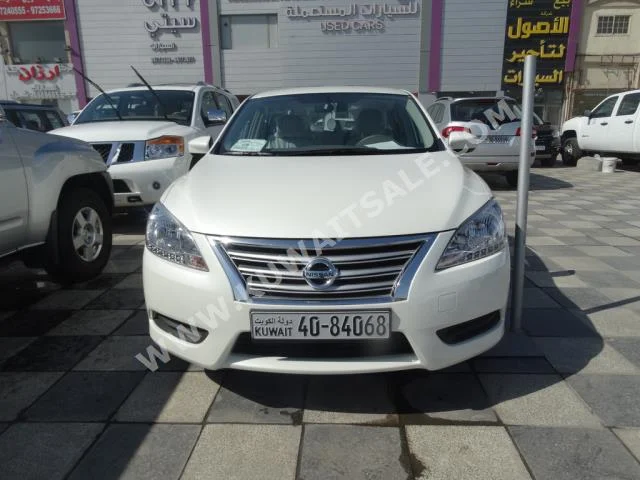 نيسان  سنترا  2016  0  سيدان  اتوماتك  4  مخمل  دفع أمامي  أبيض  بنزين