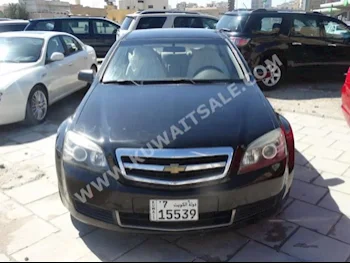 Chevrolet  LS  Caprice  2011  120,000  Sedan  Automatic  8  Cloth  RWD  Black  Gasoline