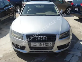 Audi  2.0 T  A5  2011  50,000  Sedan  Automatic  6  Leather  4WD  Silver  Gasoline