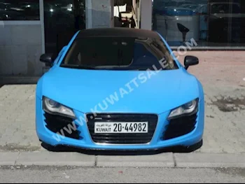 Audi  R8  2008  112,000  Coupe / Sport  Automatic  8  Leather  RWD  Blue  Gasoline