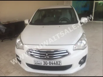متسوبيشي  أتراج  2015  41,000  سيدان  اتوماتك  3  مخمل  دفع أمامي  أبيض  بنزين