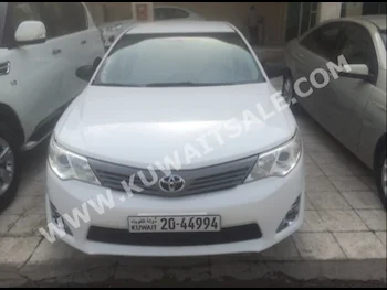 Toyota  GL  Camry  2013  95,000  Sedan  Automatic  4  Cloth  FWD  White  Gasoline