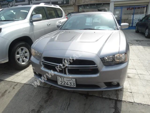 Dodge  Charger  2013  110,000  Sedan  Automatic  6  Cloth  RWD  Silver  Gasoline