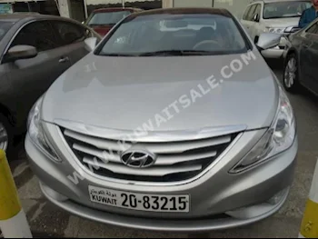 Hyundai  Sonata  2014  70,000  Sedan  Automatic  4  Cloth  FWD  Silver  Gasoline