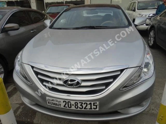 Hyundai  Sonata  2014  70,000  Sedan  Automatic  4  Cloth  FWD  Silver  Gasoline