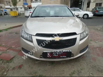 Chevrolet  LS  Cruze  2012  104,000  Sedan  Automatic  4  Cloth  RWD  Gold  Gasoline