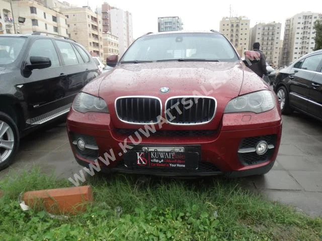 BMW  6  X-Series  2008  184,000  SUV  Automatic  6  Leather  4WD  Dark Red  Gasoline