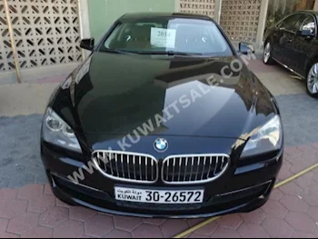 BMW  640i  6-Series  2014  60,000  Coupe / Sport  Automatic  6  Leather  RWD  Black  Gasoline