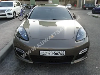 Porsche  GTS  Panamera  2013  100,000  Sedan  Automatic  8  Leather  RWD  Brown  Gasoline