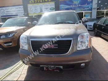 GMC  Yukon  2012  99,000  SUV  Automatic  8  Cloth  4WD  Gray  Gasoline