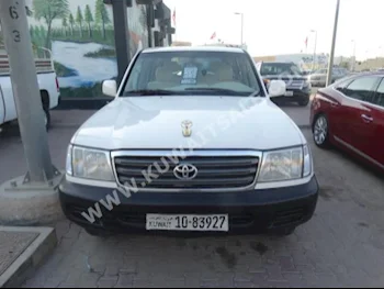 Toyota  GXR  Land Cruiser  2004  470,000  SUV  Manual  8  Cloth  4WD  White  Gasoline