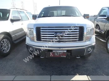Ford  150  F  2012  129,000  Pick Up  Automatic  8  Cloth  4WD  White  Gasoline