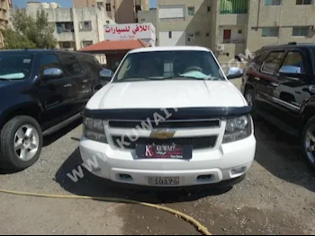 Chevrolet  LT  Tahoe  2013  89,000  SUV  Automatic  8  Cloth  4WD  White  Gasoline