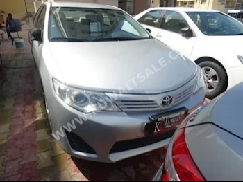 Toyota  GL  Camry  2015  74,000  Sedan  Automatic  4  Cloth  FWD  Silver  Gasoline